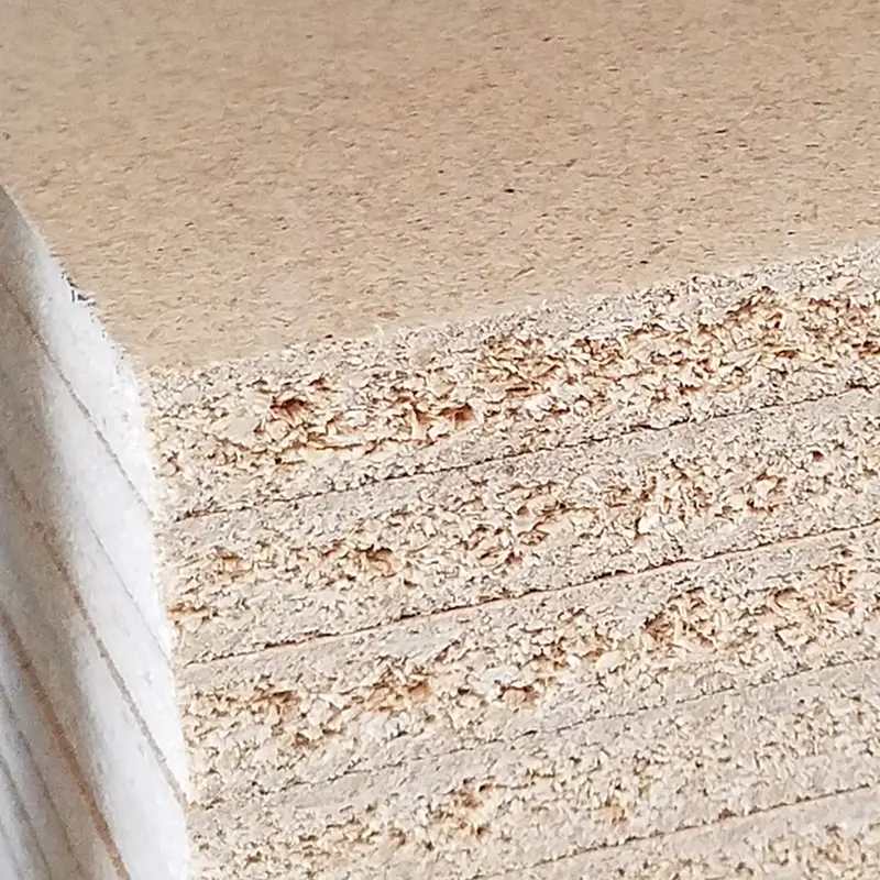 A stack of particle board panels.