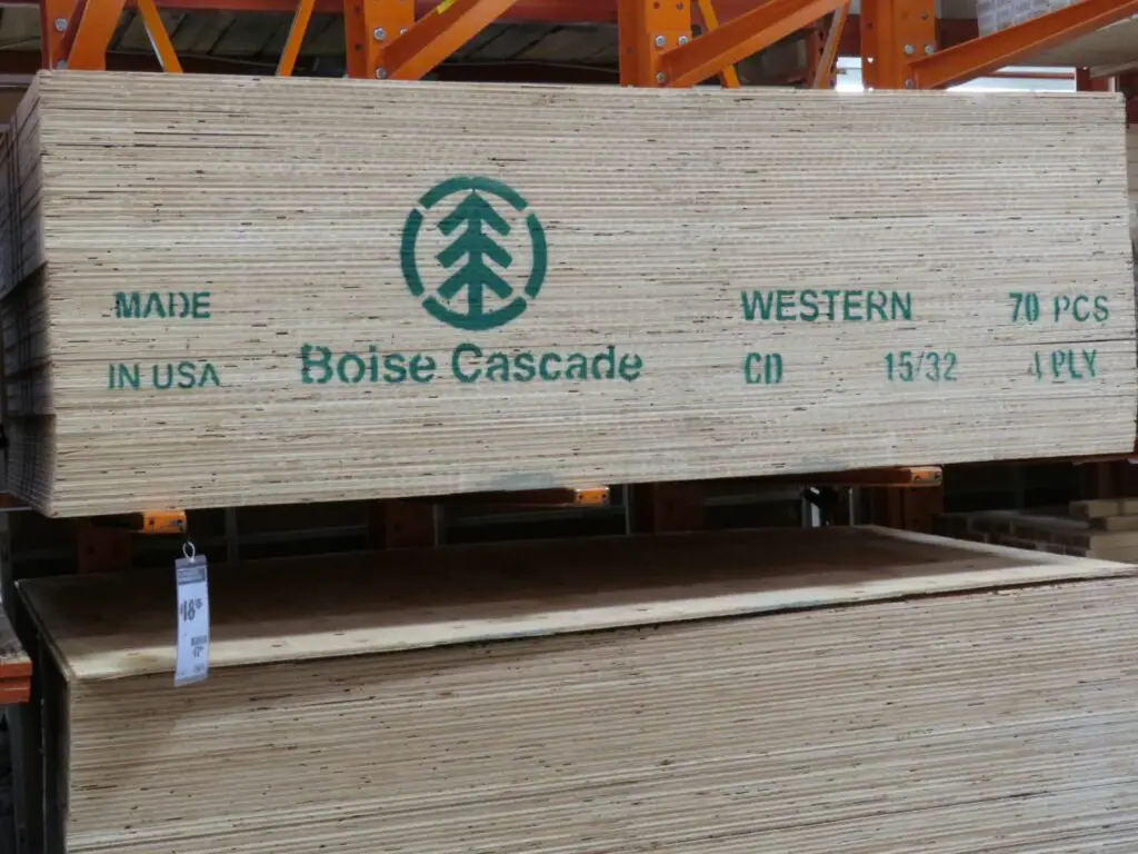 Stacks of 4’ x 8’ softwood plywood panels, 15/32-inch thick. Each sheet weighs about 40 pounds, so each one of those stacks weighs almost a ton and a half.