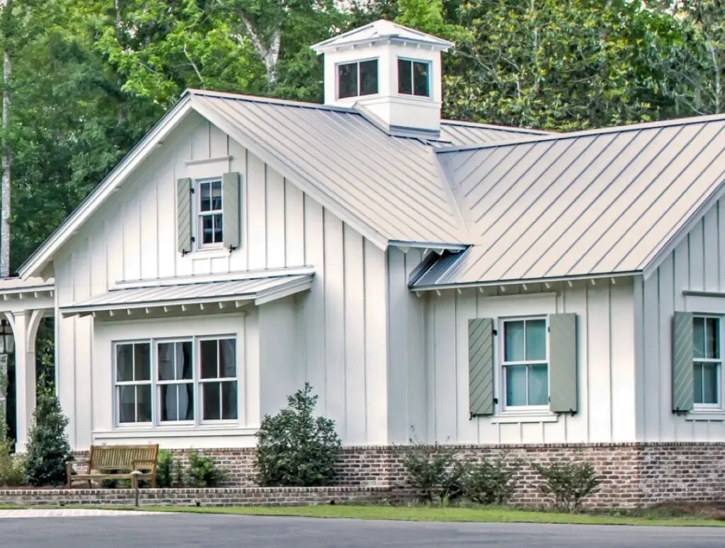 A house with a mill-finish standing seam aluminum roof.