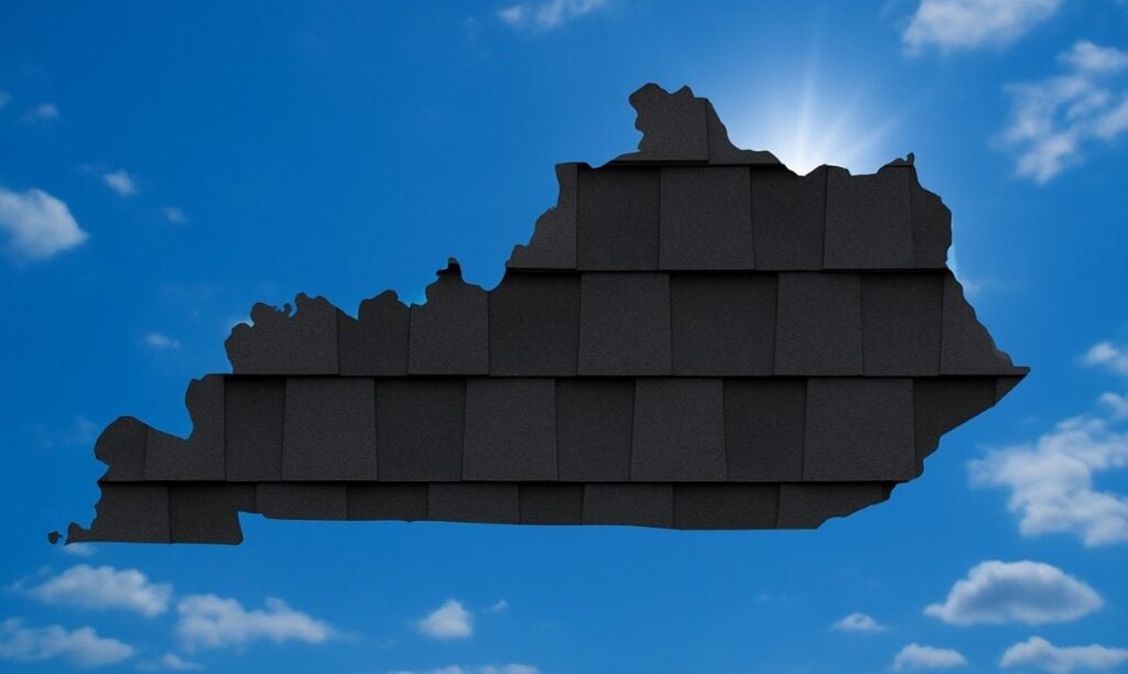 Outline of the State of Kentucky filled in with an image of asphalt shingles, set against a background of blue sky with clouds and sun.