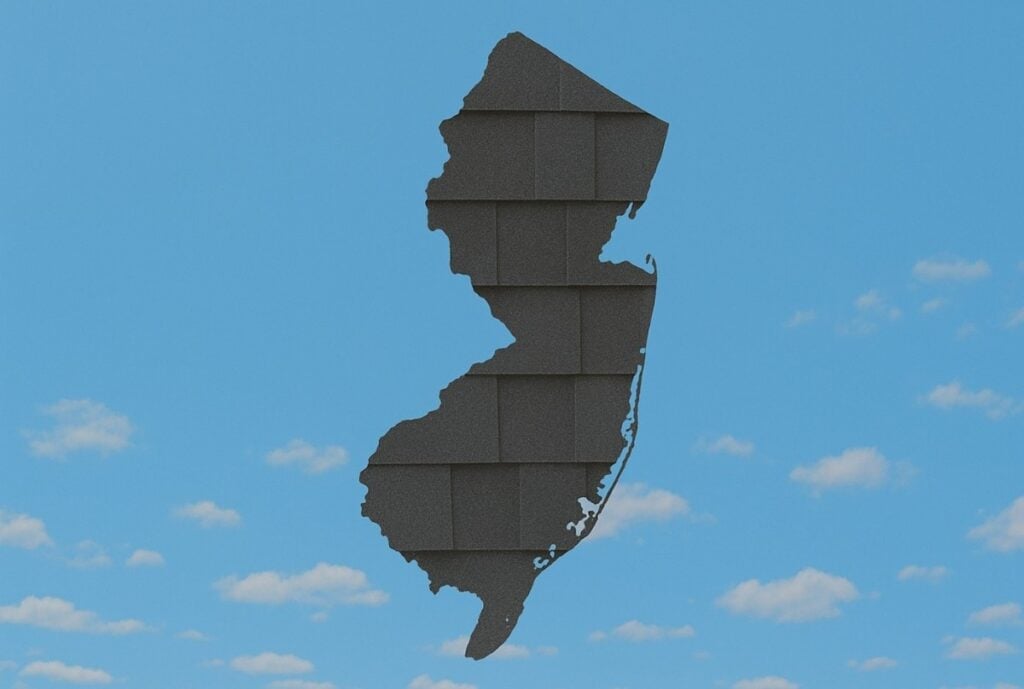 Outline of the State of New Jersey filled in with an image of asphalt shingles, set against a background of blue sky with clouds.