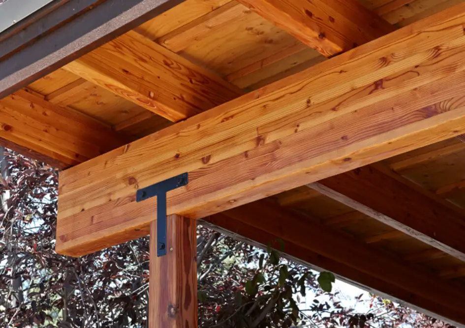 A glulam beam used as a supporting member for an outddor structure.