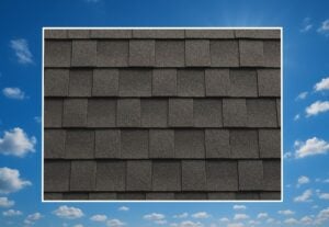 Outline of the State of Wyoming filled in with an image of asphalt roof shingles, set against a background of blue sky with clouds and sun.