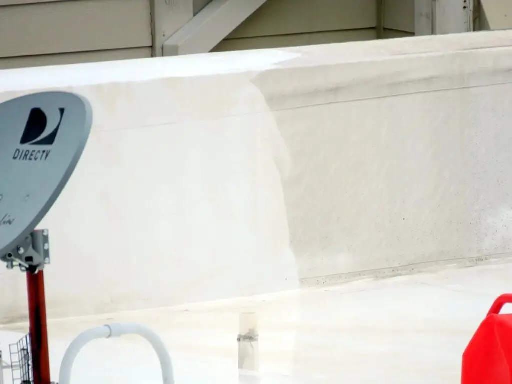 Clean TPO roofing on the left vs. dirty TPO roofing right.